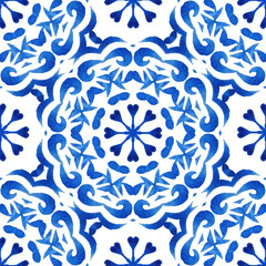 Blue seamless ornamental watercolor tiled pattern hand drawn graphic mandala