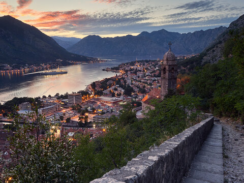 Panoramic view of the historic town of Kotor and Kotor Bay in the evening after sunset. Montenegro by night.
