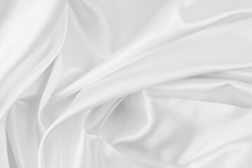 Naklejka premium Rippled white silk fabric texture background 