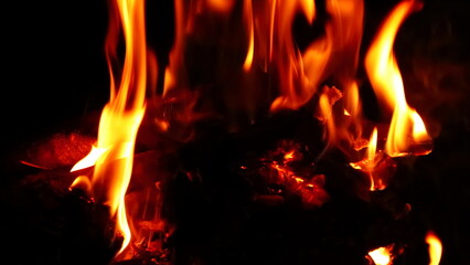 Beautiful orange yellow fire from the campfire. Piękny pomarańczowy żółty ogień z ogniska. © jarizPJ