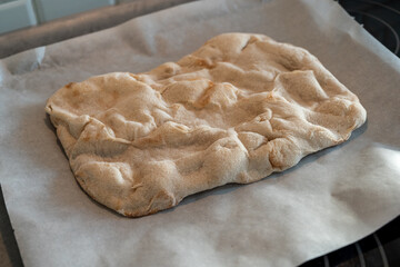 freshly baked homemade yummy pizza dough, square