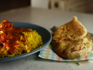 Chicken Korma curry with Pilau rice and naan bread