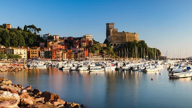Panoramic Day to Night Sunset Time Lapse of Porto di Lerici and Castello di Lerici with many boats, Lerici, Liguria, Italy