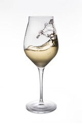 glass of white wine on white background