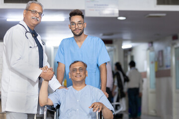 Obraz premium portrait of a person in a wheelchair with doctor in hospital 