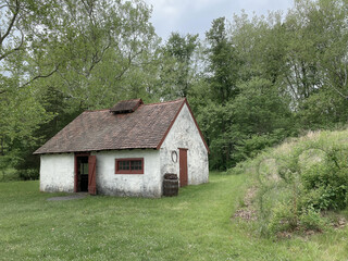 Fototapeta na wymiar Blacksmith shop at Hopewell Furnace National Historic Site in Pennsylvania. Example of American 19th century rural 