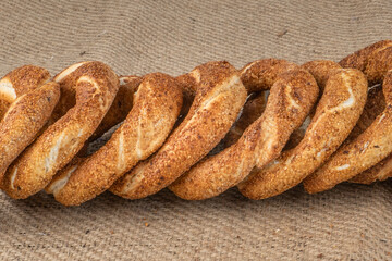 Turkish Bagel Simit with sesame, traditional pastry of Turkey.Traditional street food for Turkey , Turkish names ' simit or gevrek'.