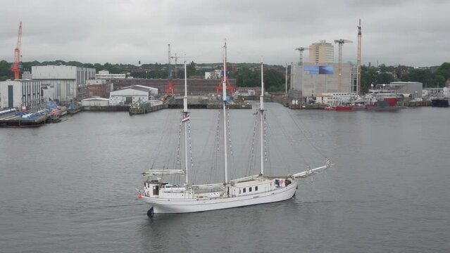Sailing ship, boat with Kiel port/harbour in the background