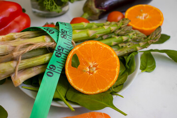 Measuring tape vegetables and fruits