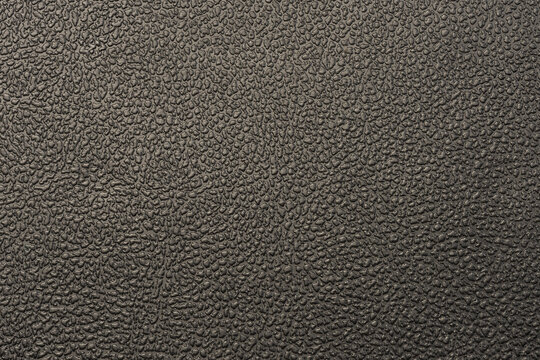 Macro shot of black vinyl embossed texture