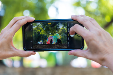 person taking a photo of a tourist destination in Mendoza Argentina