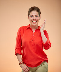 Happy laughing young lady in red shirt isolated portrait.