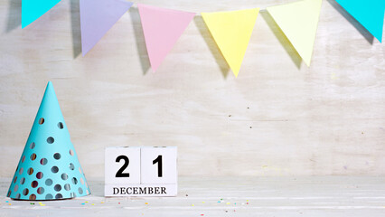 Birthday December 21 on the calendar. Happy birthday card with date copy space. Holiday decorations...