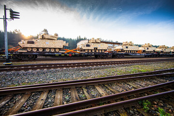 Obraz premium Pabrade/Lithuania October 21, 2019 US Army's 1st Armoured Battalion of the 9th Regiment, 1st Division from Fort Hood in Texas Bradley is unloaded as they arrive at the Pabrade railway station.