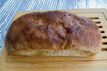 Fresh homemade bread on wooden board