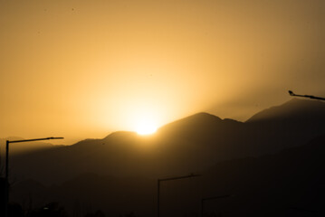 landscape in the shadows of a sunset, clear sky