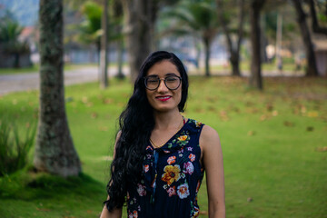 Fototapeta premium young woman in public square publishes model for media 