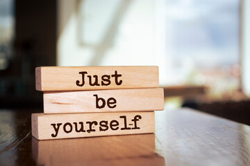 Wooden blocks with words 'Just Be Yourself'. - obrazy, fototapety, plakaty