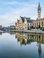 Fototapeta na wymiar Historic medieval buildings and their reflection on Leie river in Ghent, Belgium