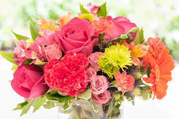 Close up of beautiful fresh centerpiece of  a variety of colorful flowers.