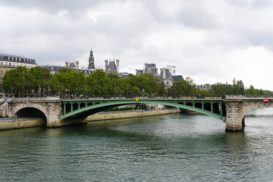 Paris, France - Pont d'Arcole, a bridge in Paris over the River Seine, which connects Place de l'Hôtel-de-Ville and île de la Cité.  Image has copy space.