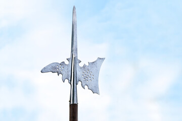 Metal top of a halberd, also called halbard, halbert or Swiss voulge, with axe blade and spike...