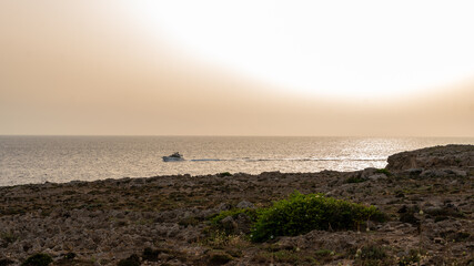 warm sunset light in Menorca - 520910156