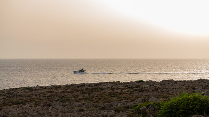 warm sunset light in Menorca - 520910162