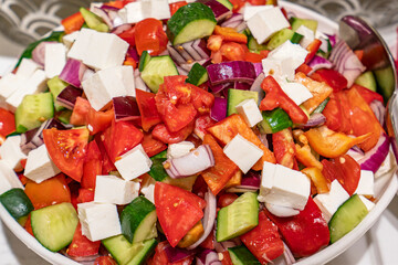 delicious and fresh salats with various fruits and vegetables