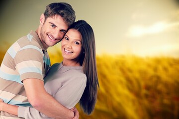 A couple being romantic  while posing. Love and relationships outdoors.