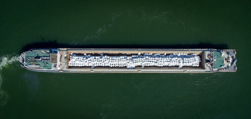 Ship over the Danube river near Vidin, Bulgaria drone shot from above