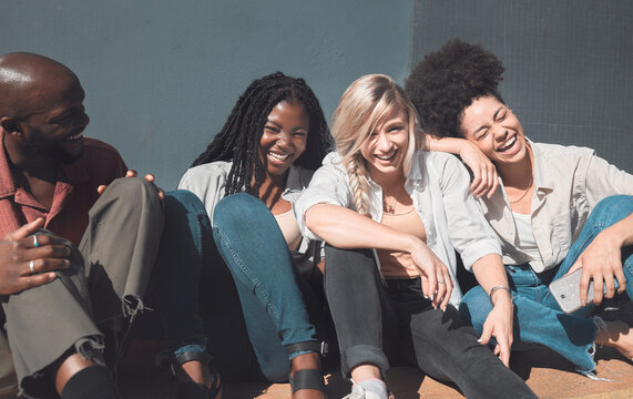 Happy, Trendy And Carefree Friends Laughing, Talking And Having Fun Enjoying Their Free Time Together Outside. Diverse Group Bonding, Hangout Out And Relaxing While Catching Up On The Weekend