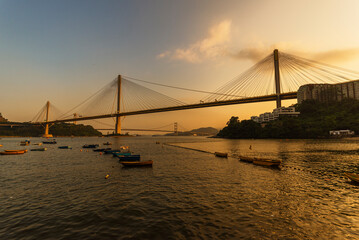 Fototapeta na wymiar Ting Kau Bridge and Tsing Ma Bridge in Hong Kong under sunset