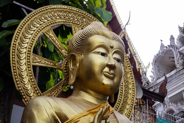 Obraz premium Buddha statue in Wat Phra That Cho Hae, Phrae Province, Thailand.