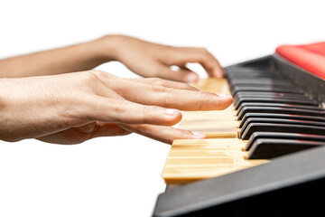 Closeup view of human hand playing electronic piano keyboard