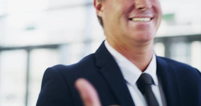 Confident, happy and positive business man giving thumbs up while walking and feeling goofy or fun. Portrait of a mature corporate professional smiling after good news about promotion or success