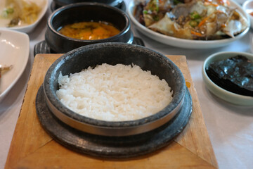 Freshly made Hot Stone Pot Rice is served.
