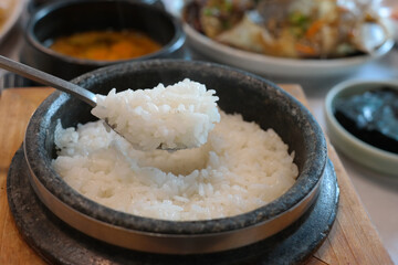 Freshly made Hot Stone Pot Rice is served.