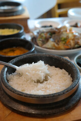 Freshly made Hot Stone Pot Rice is served.