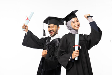 Two excited asian graduate students carrying certificate on white background