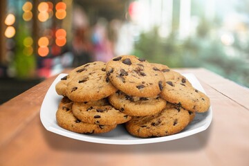 Tasty homemade cookies with chocolate chips on the desk