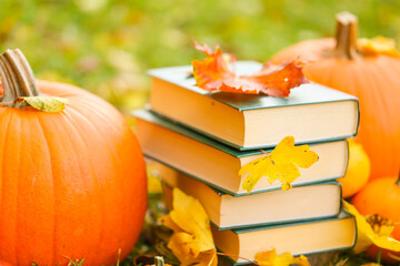 Autumn books. back to school.Study and education concept. Autumn cozy reading.Stack of...