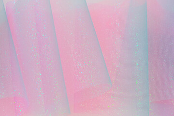 iridescent gradient texture.Shiny pink fabric with gradients. texture with iridescent waves and...