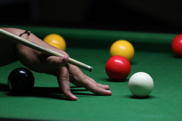 Close-up shot of a pool game