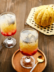 Es Blewah, contain slices of cantaloupe with syrup, basil seed and ice. Popular during Ramadhan in Indonesia. 