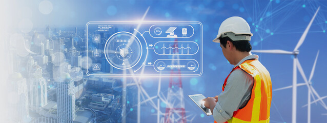 Double exposure-engineer use smart tablet,control check operation wind turbine,energy...