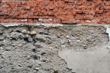 Crack wall brick plaster texture. Old abstract broken architecture background. Scratched stucco. For banner and wallpaper.