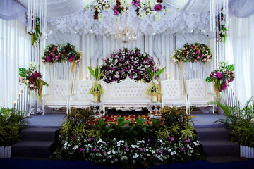 Wedding decorations. Wedding backdrop with flowers and Indonesian wedding decorations.