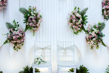 Fototapeta na wymiar Wedding decorations. Wedding backdrop with flowers and Indonesian wedding decorations.