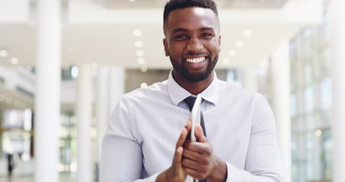 Happy young businessman pointing at you in a modern office. Smiling business man employer looking and selecting person for new job. Excited male at office choosing employee and clapping hands.